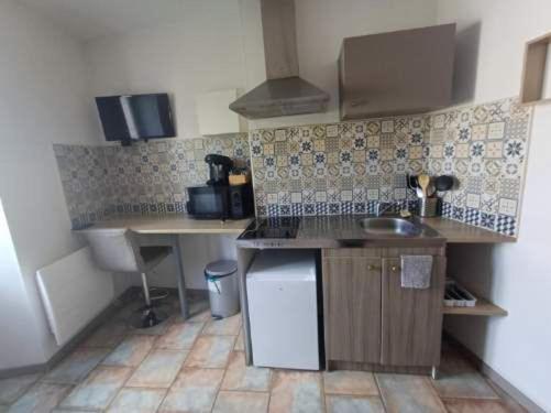 Η κουζίνα ή μικρή κουζίνα στο Le Lumineux