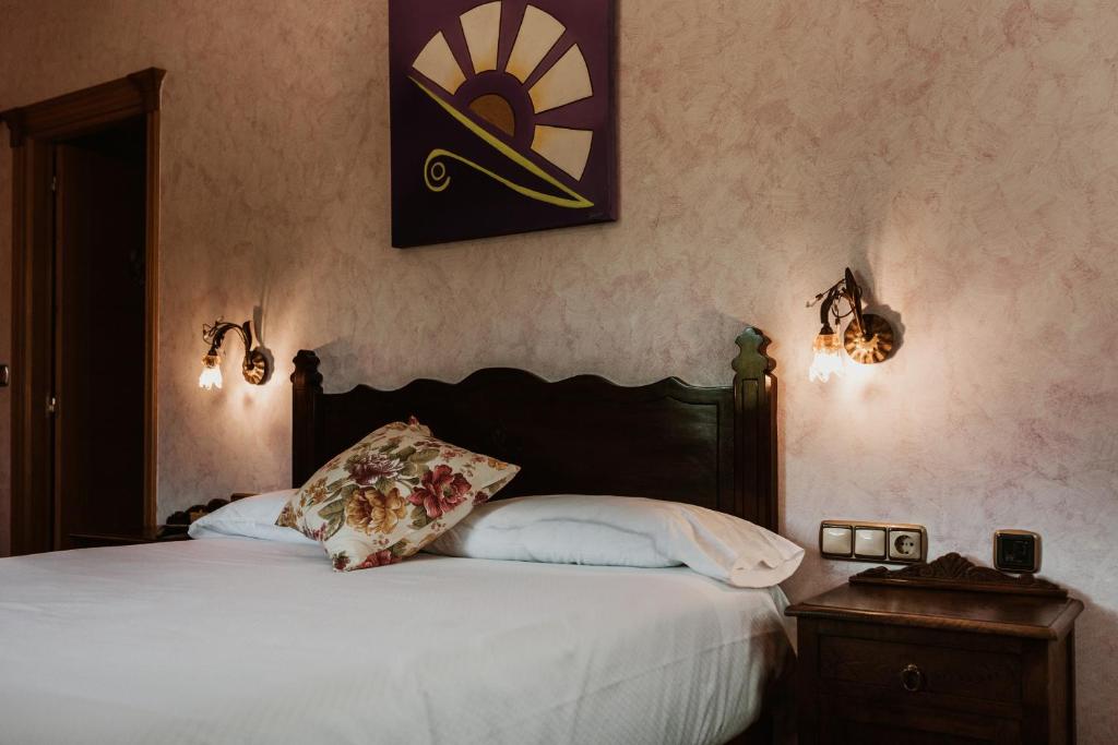 Postel nebo postele na pokoji v ubytování Casa da Capilla