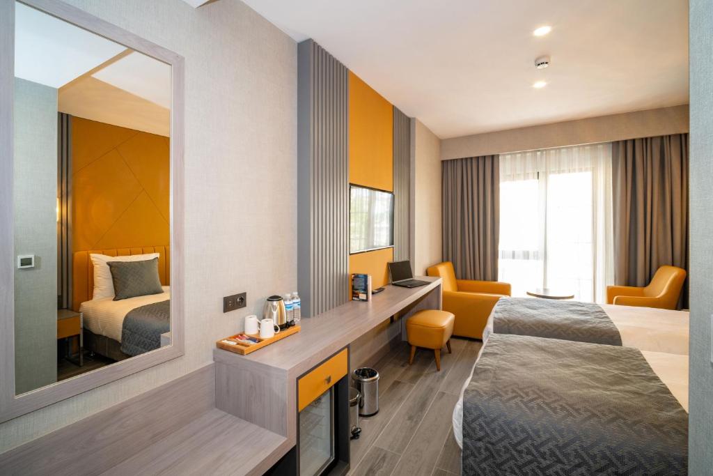 Postel nebo postele na pokoji v ubytování Icon Hotel Bomonti