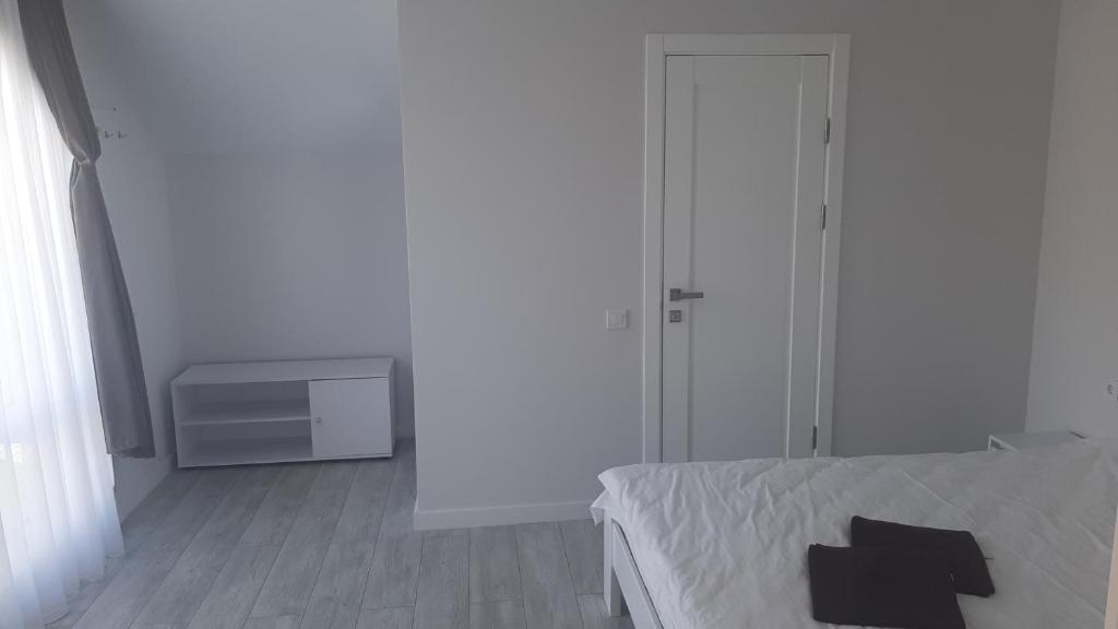 Postel nebo postele na pokoji v ubytování Софія
