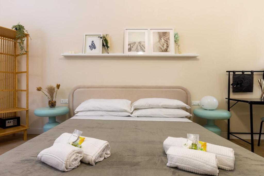 Postel nebo postele na pokoji v ubytování Aureum Angelicum