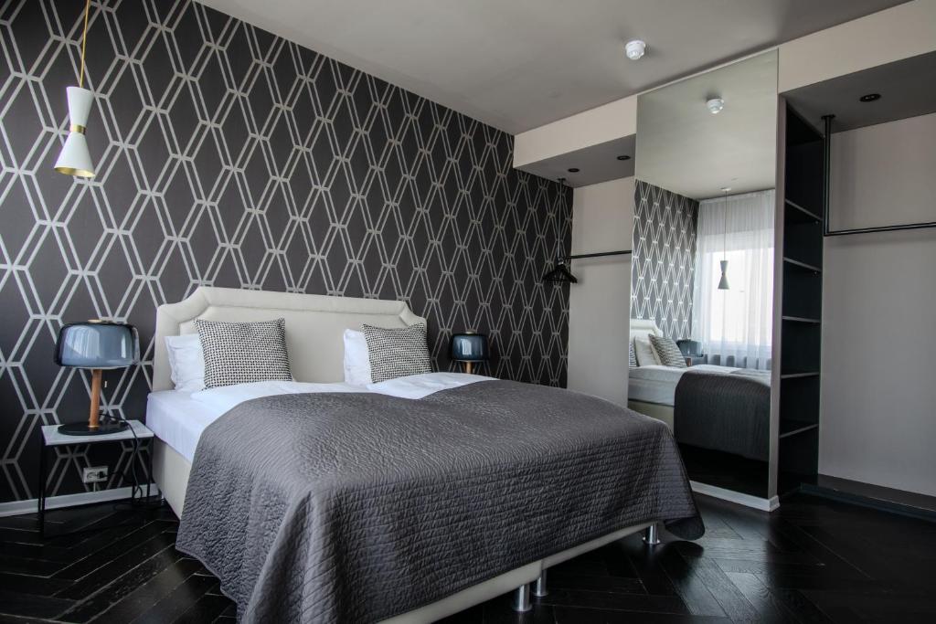 Postel nebo postele na pokoji v ubytování Máni Apartments
