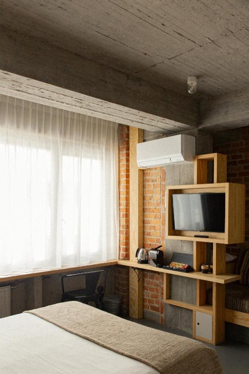 TV a/nebo společenská místnost v ubytování JAM Brussels
