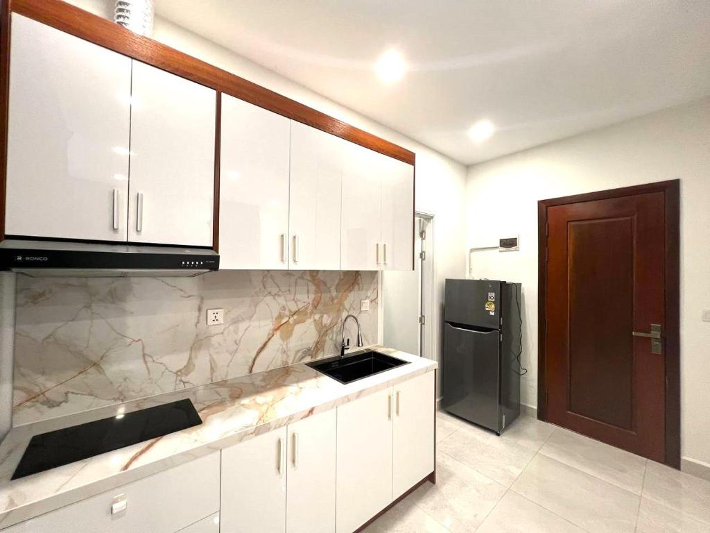Kuchyň nebo kuchyňský kout v ubytování C-Hotel