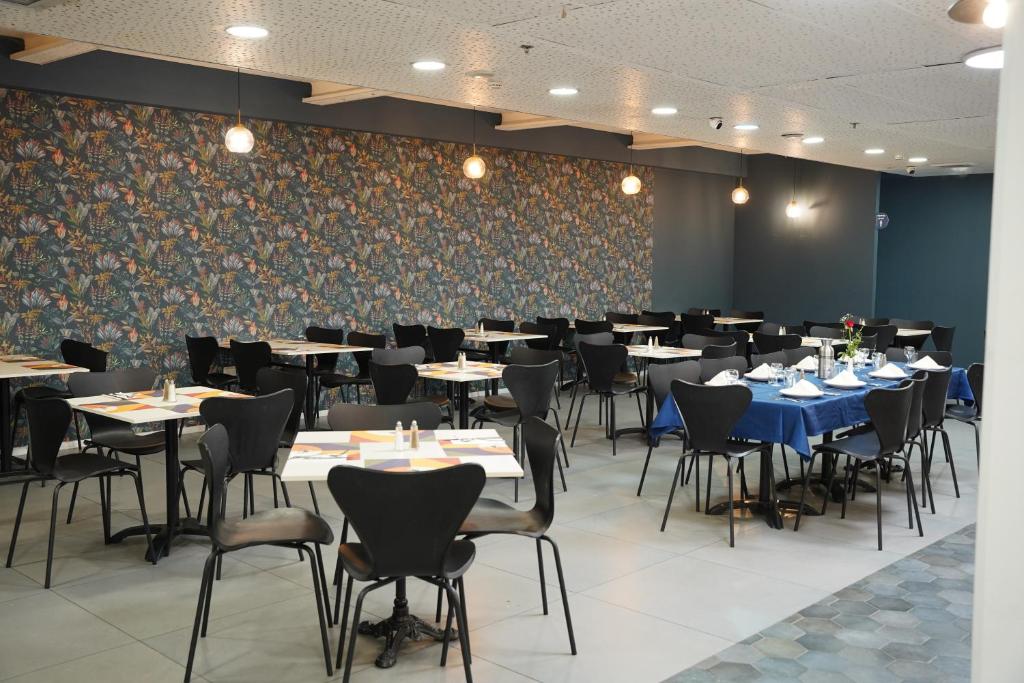 Restaurace v ubytování Spirit of Herzl Hotel הרוח של הרצל