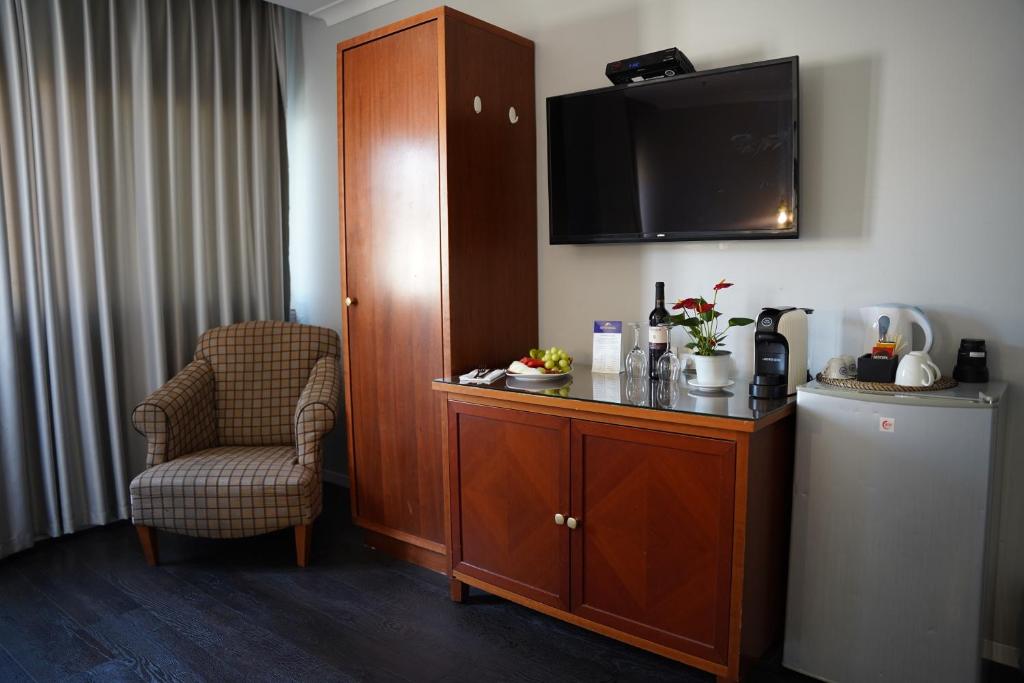 Kuchyň nebo kuchyňský kout v ubytování Spirit of Herzl Hotel הרוח של הרצל