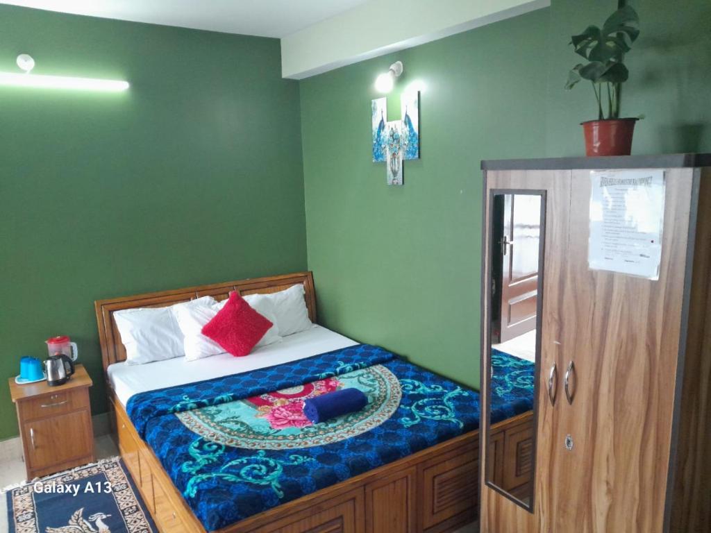 Postel nebo postele na pokoji v ubytování Seven Hills Homestay