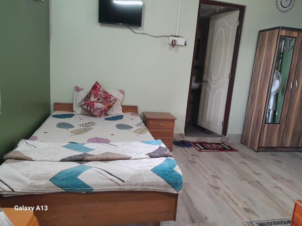 Postel nebo postele na pokoji v ubytování Seven Hills Homestay