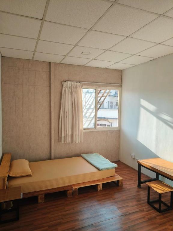 Postel nebo postele na pokoji v ubytování Peakman Residence