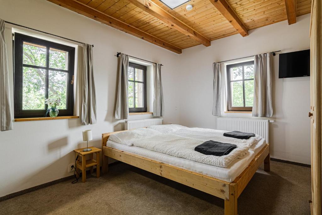 Postel nebo postele na pokoji v ubytování Chata Bramberk