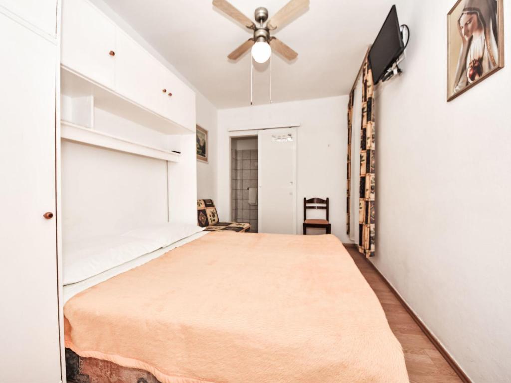 Posteľ alebo postele v izbe v ubytovaní Apartment Tino-2 by Interhome