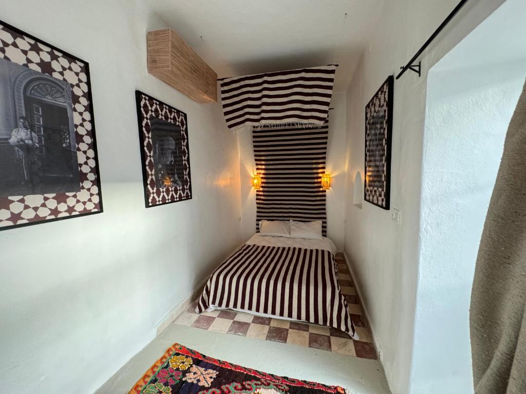 Postel nebo postele na pokoji v ubytování Riad Ait El Mouden