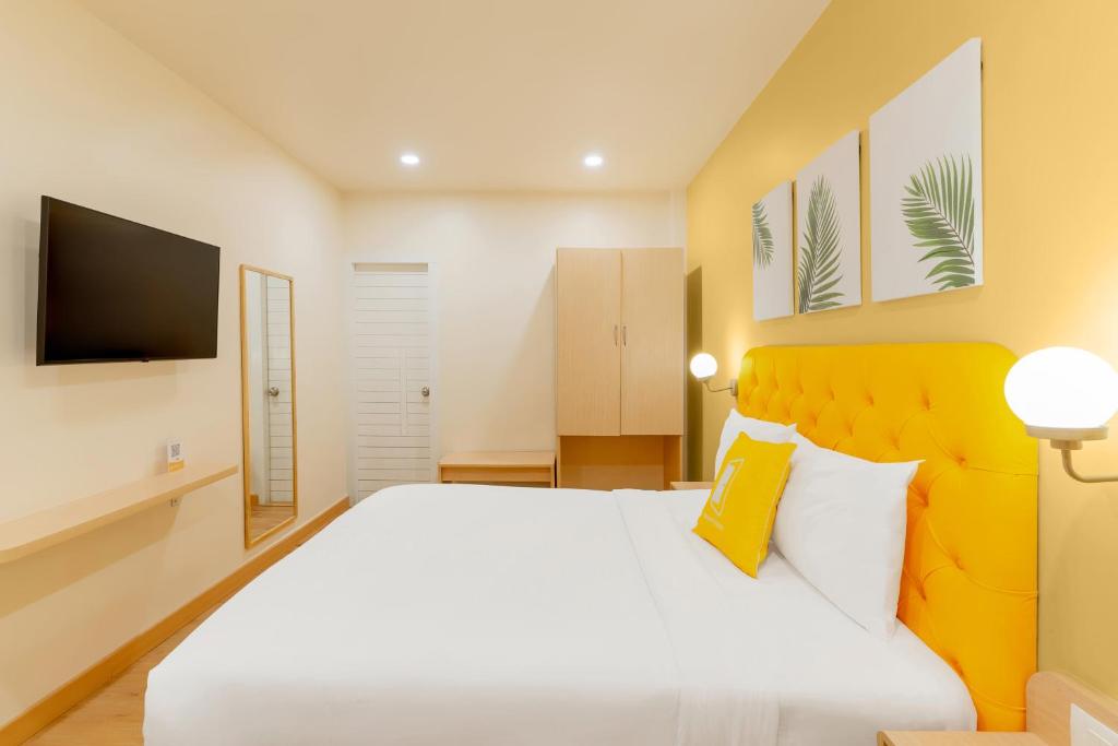 Postel nebo postele na pokoji v ubytování Bloom Hotel - CR Park