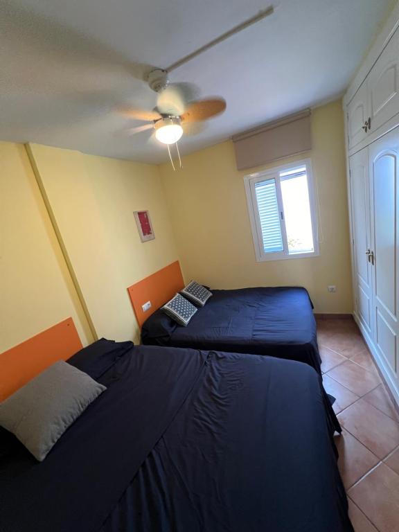 Postel nebo postele na pokoji v ubytování Apartamento a 2 minutos andando a la playa.
