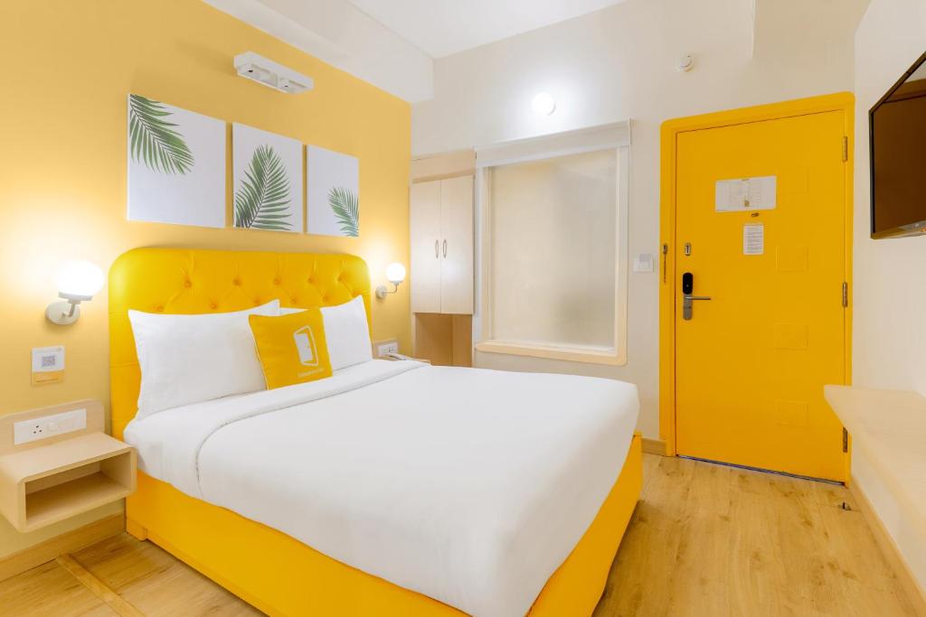 Postel nebo postele na pokoji v ubytování Bloom Hotel - CR Park