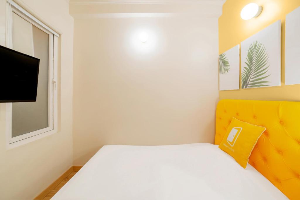 Postel nebo postele na pokoji v ubytování Bloom Hotel - CR Park