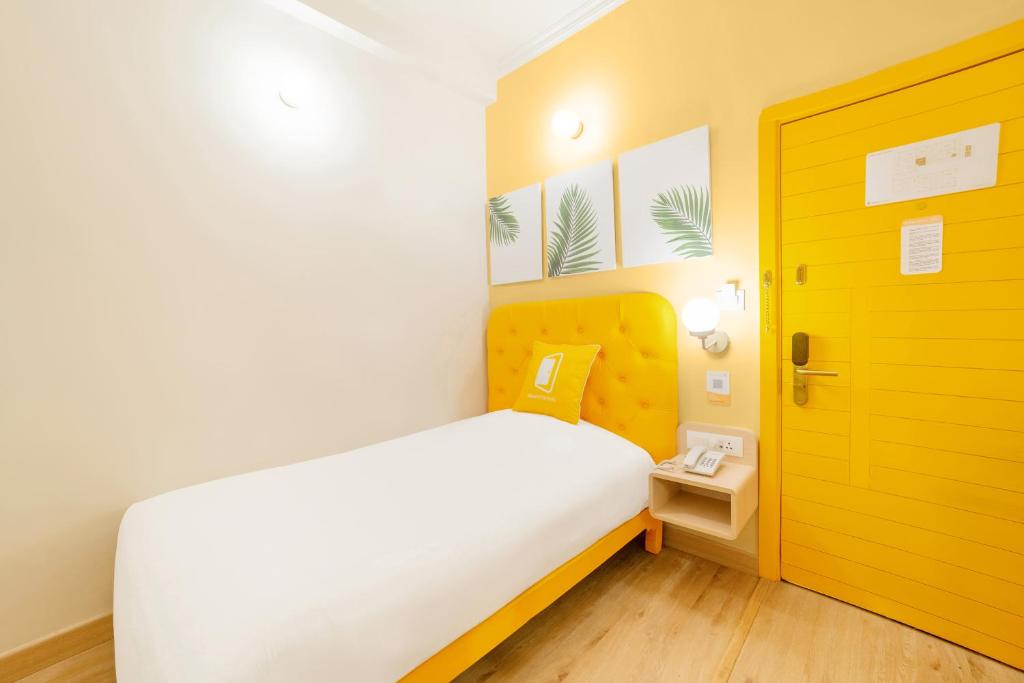 Postel nebo postele na pokoji v ubytování Bloom Hotel - CR Park