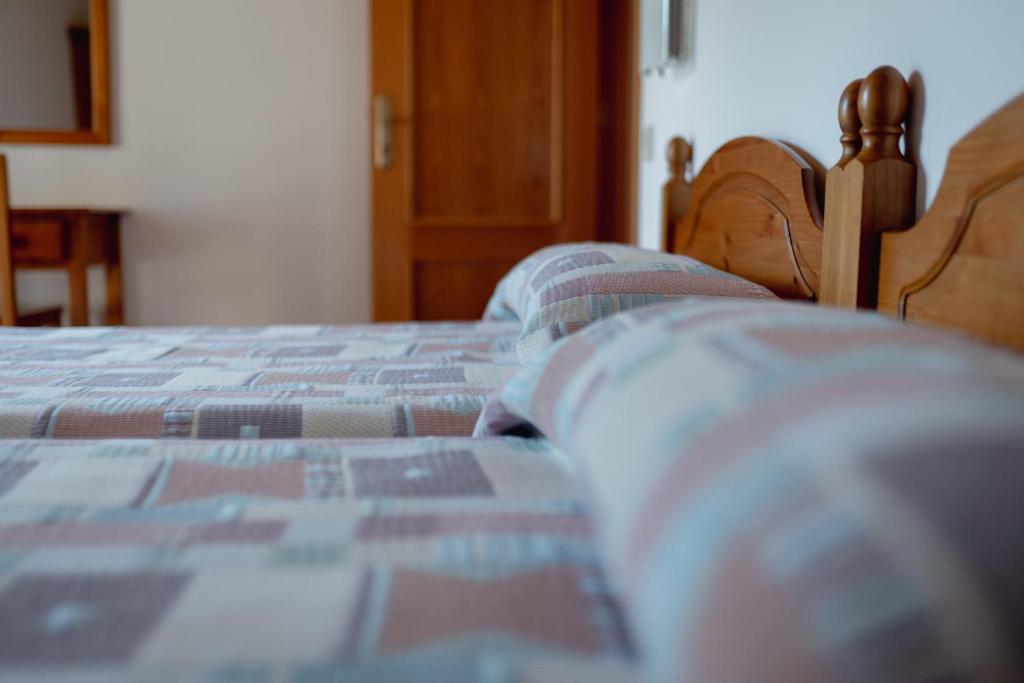 Postel nebo postele na pokoji v ubytování El Portal de la Irene Apartamentos Rurales