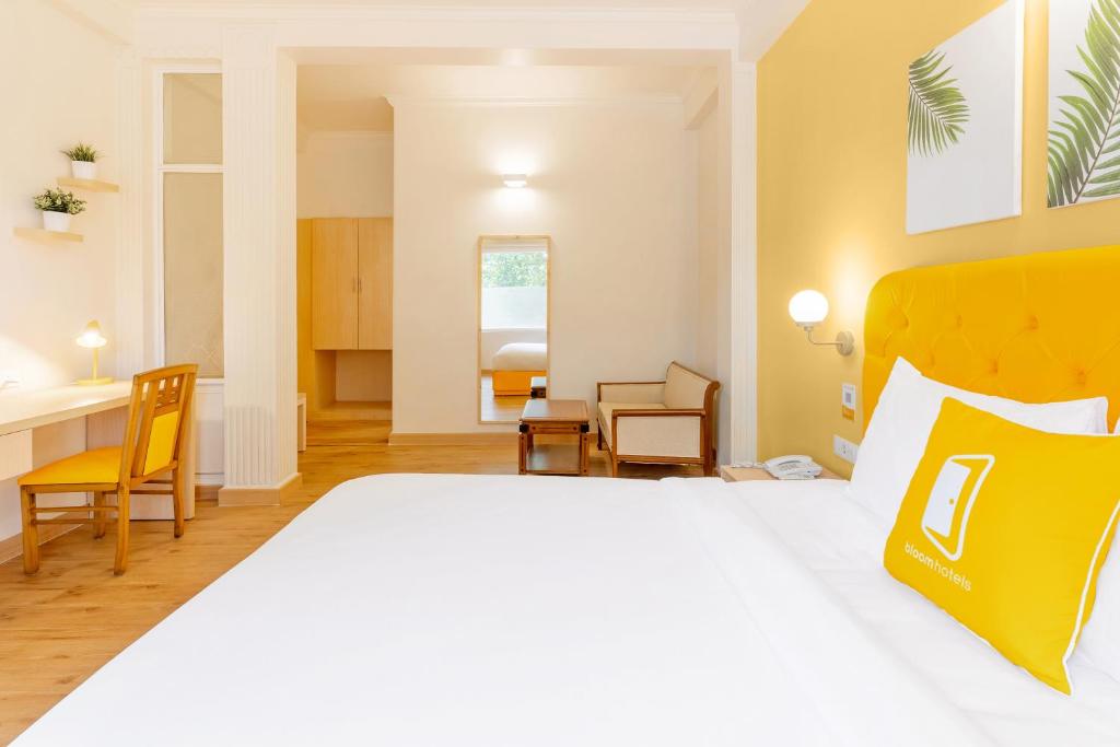 Postel nebo postele na pokoji v ubytování Bloom Hotel - CR Park