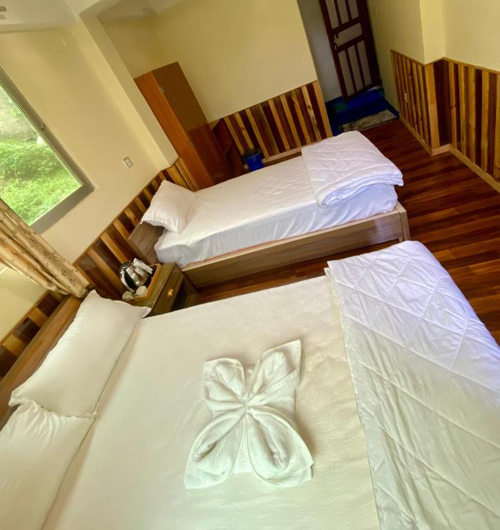 Postel nebo postele na pokoji v ubytování Hotel Alina Chuchure