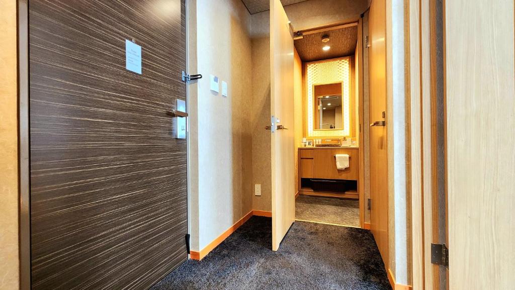 Koupelna v ubytování ひがし茶屋街らしく金沢 Hotel Rashiku kanazawa