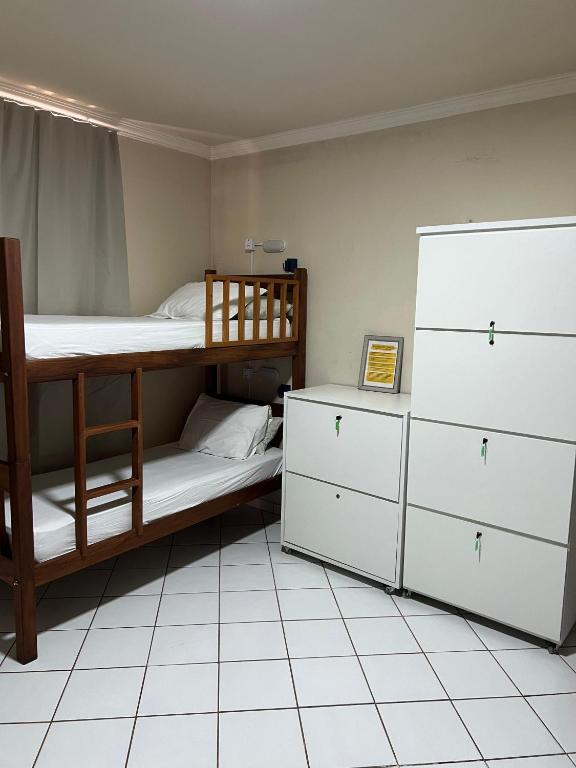 Postel nebo postele na pokoji v ubytování Hostel Da Jô