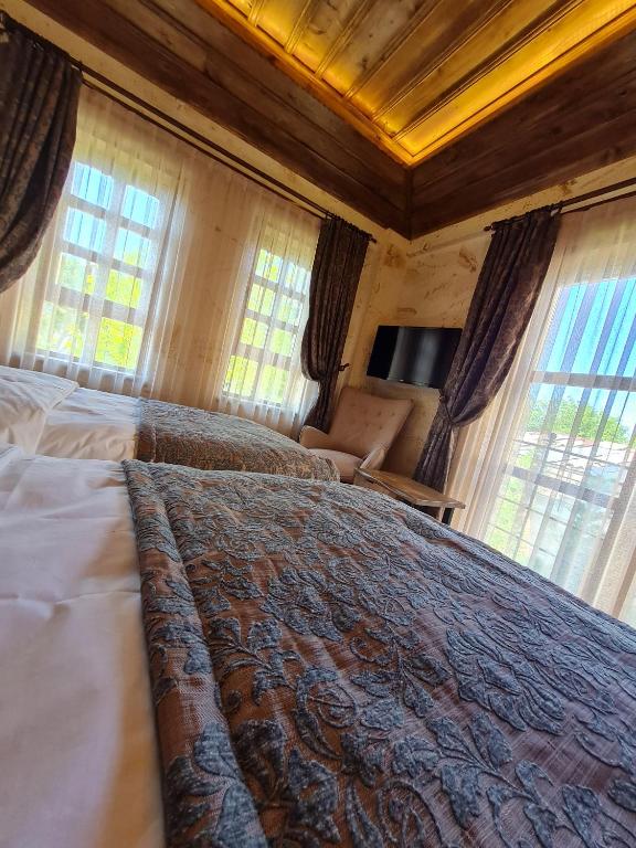 Postel nebo postele na pokoji v ubytování Flavia Cappadocia Hotel