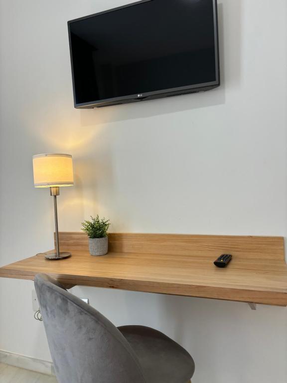 TV a/nebo společenská místnost v ubytování Hotel Lince
