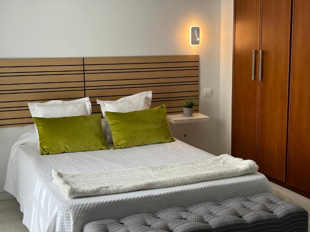 Postel nebo postele na pokoji v ubytování Hotel Lince
