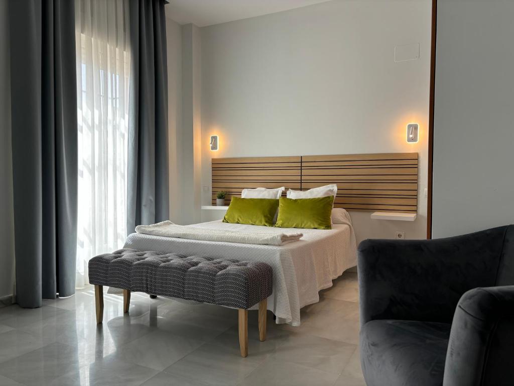 Postel nebo postele na pokoji v ubytování Hotel Lince