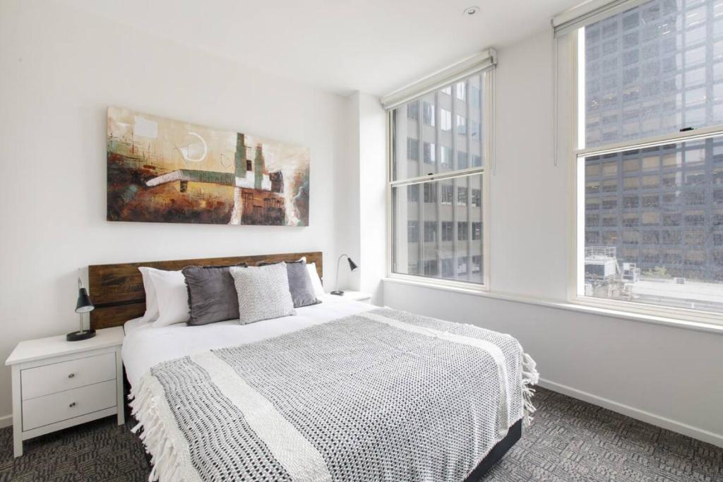 Ένα ή περισσότερα κρεβάτια σε δωμάτιο στο Charming 2-Bedroom, Apartment in Inner Melbourne