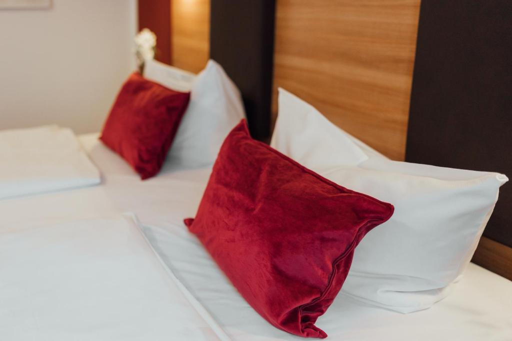 Postel nebo postele na pokoji v ubytování Hotel Andra München