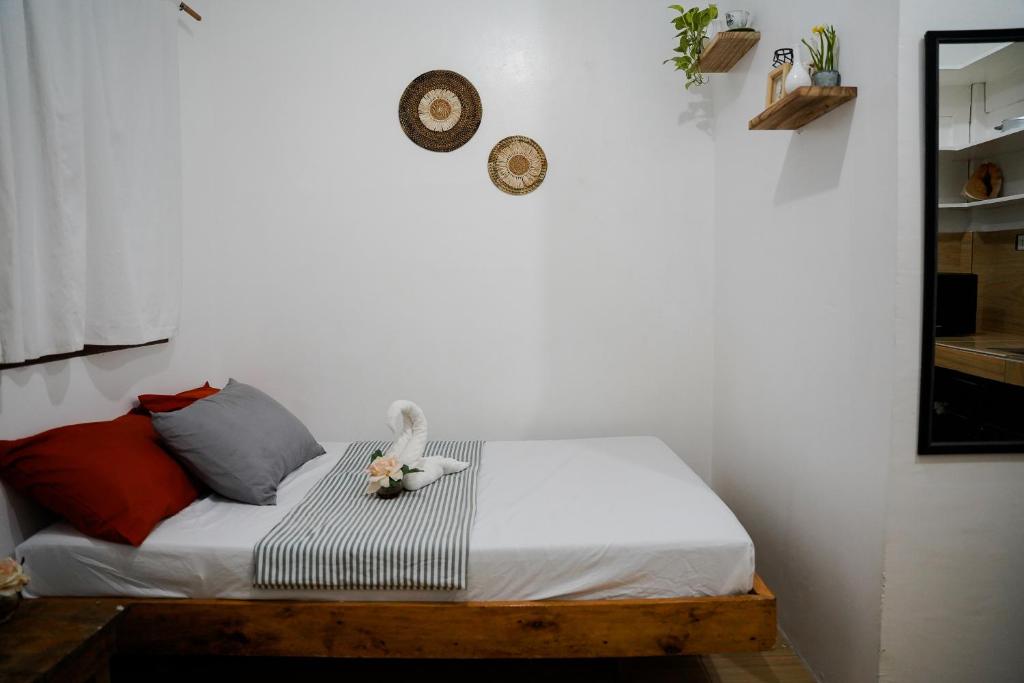 Postel nebo postele na pokoji v ubytování TOBY HOUSE SiARGAO