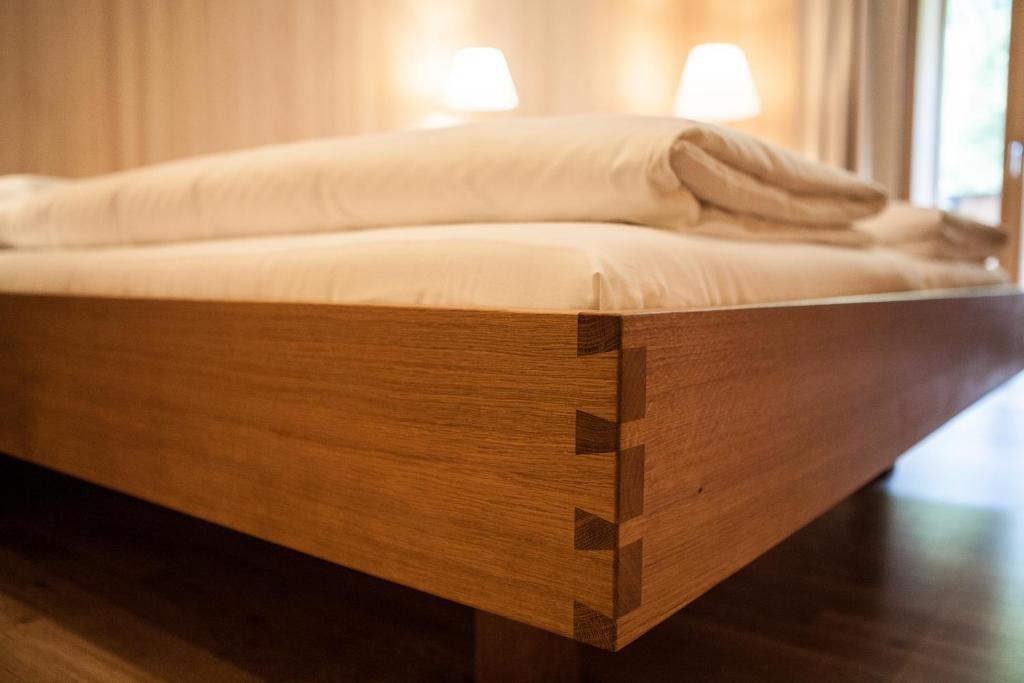 Postel nebo postele na pokoji v ubytování Biohotel Schwanen