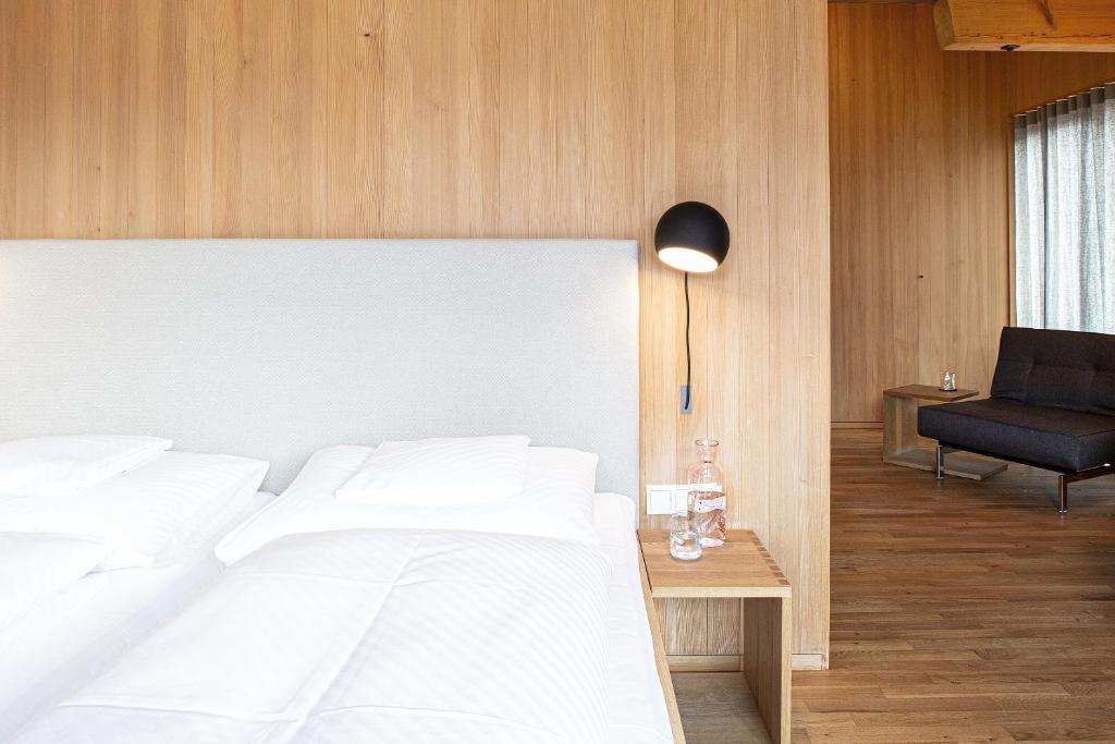 Postel nebo postele na pokoji v ubytování Biohotel Schwanen