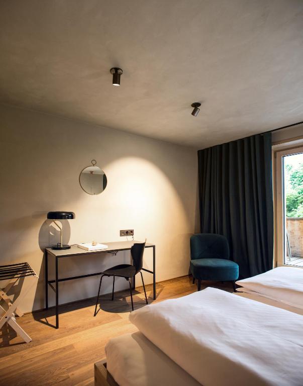 Postel nebo postele na pokoji v ubytování Biohotel Schwanen