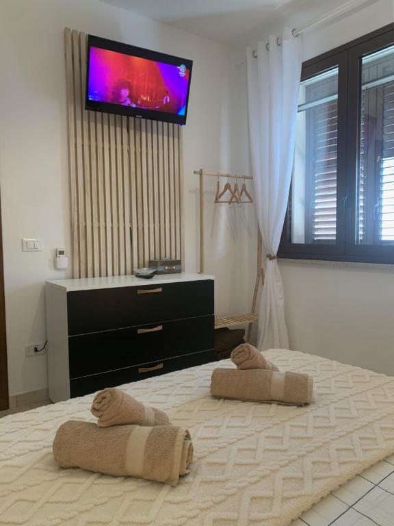 Łóżko lub łóżka w pokoju w obiekcie Kite Village Solaris