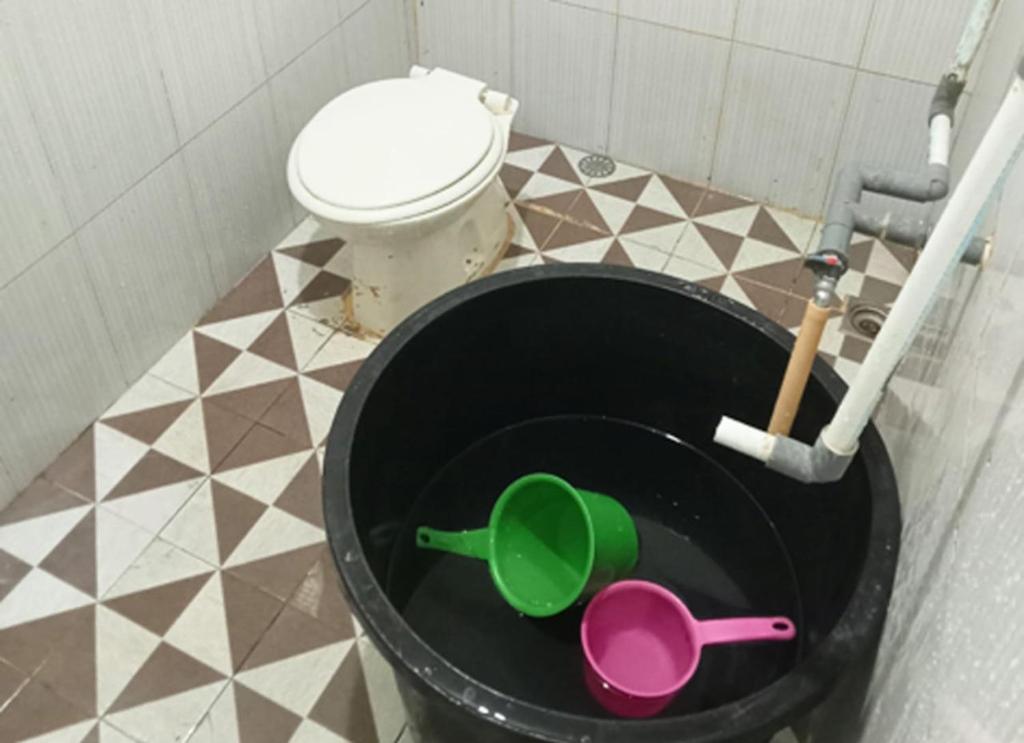 Koupelna v ubytování Benatsya Homestay