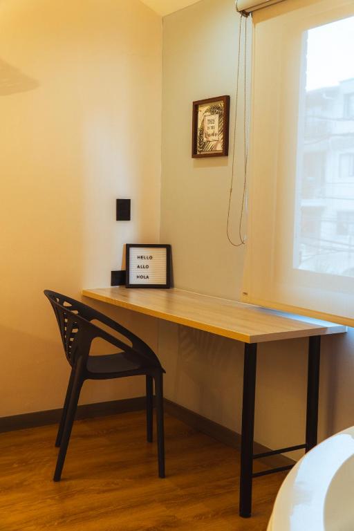 Una cama o camas en una habitación de Casa Origo Hospedaje