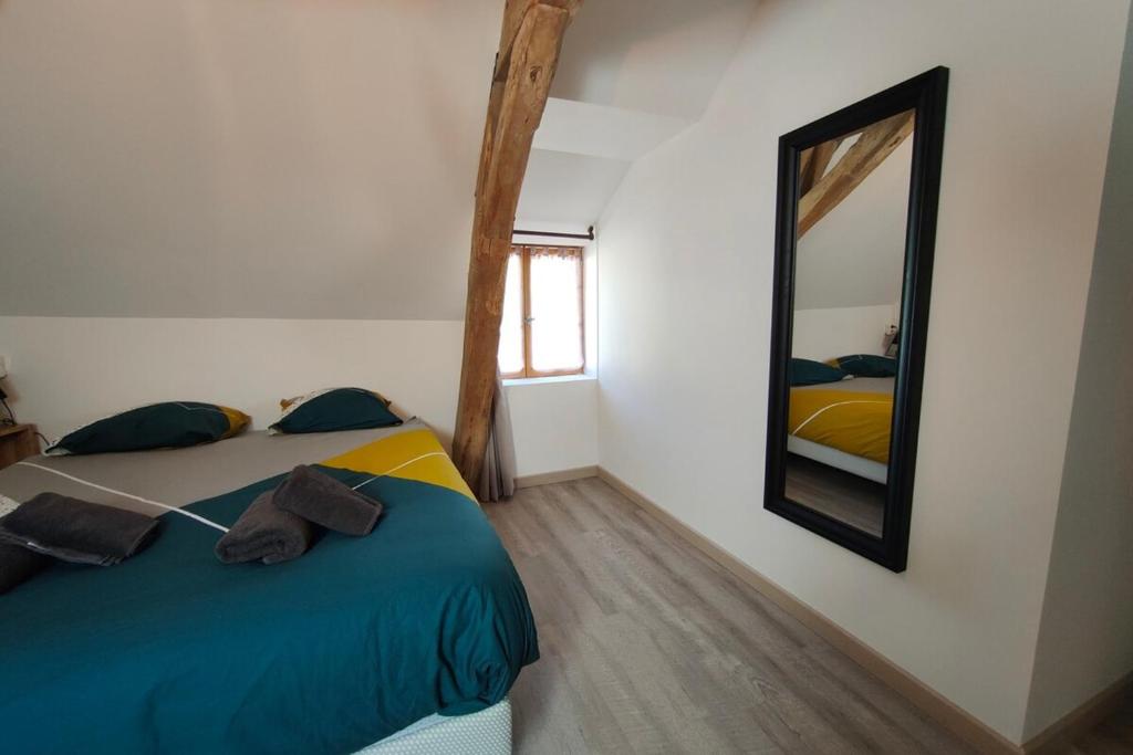 Posteľ alebo postele v izbe v ubytovaní Les capucines proche Beauval & châteaux