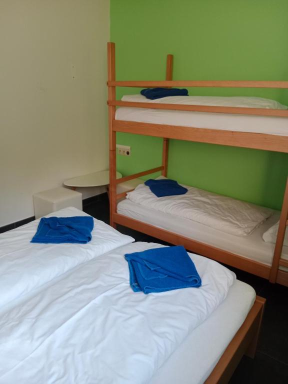 Postel nebo postele na pokoji v ubytování Penzion TOPAS