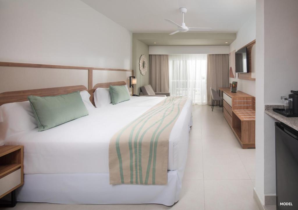 Postel nebo postele na pokoji v ubytování Riu Negril - All Inclusive