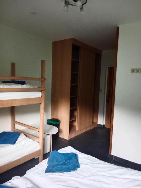 Postel nebo postele na pokoji v ubytování Penzion TOPAS