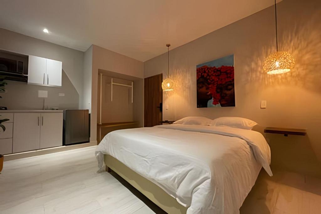 Postel nebo postele na pokoji v ubytování Marmulata Lofts