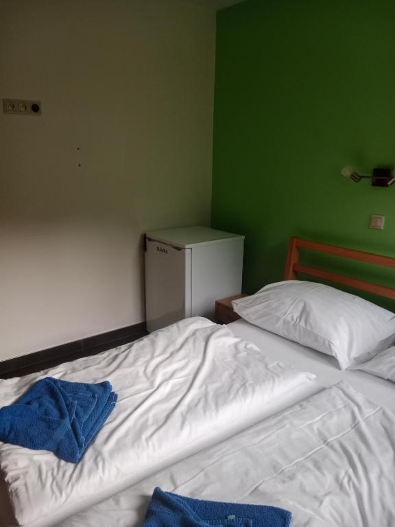 Postel nebo postele na pokoji v ubytování Penzion TOPAS