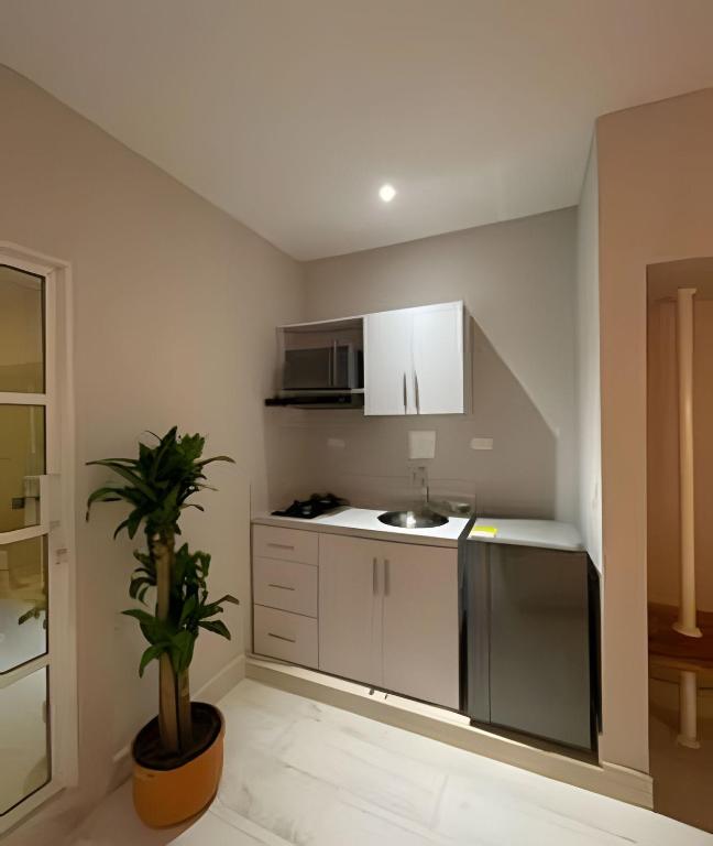 Kuchyň nebo kuchyňský kout v ubytování Marmulata Lofts
