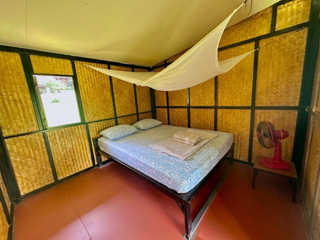 Postel nebo postele na pokoji v ubytování Twin Hut