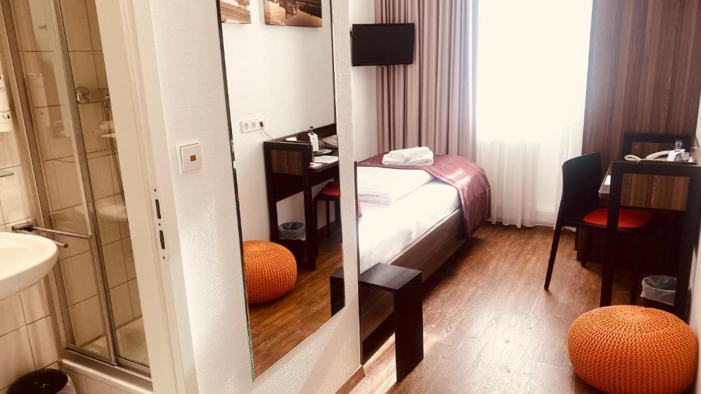 Voodi või voodid majutusasutuse sevenDays Hotel Karlsruhe toas