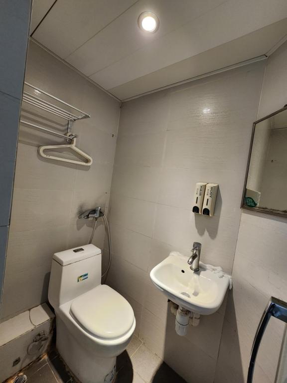 Vannituba majutusasutuses 香港金門賓館 KamMun Guest House