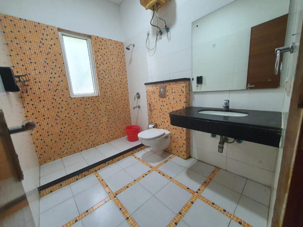 Kuchyň nebo kuchyňský kout v ubytování Mallenzo Suites Dlf Phase 1